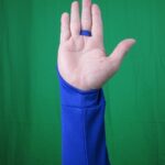 Driver Sun Protection Sleeve Royal Blue closeup with the loop around the finger to hold it in place palm side